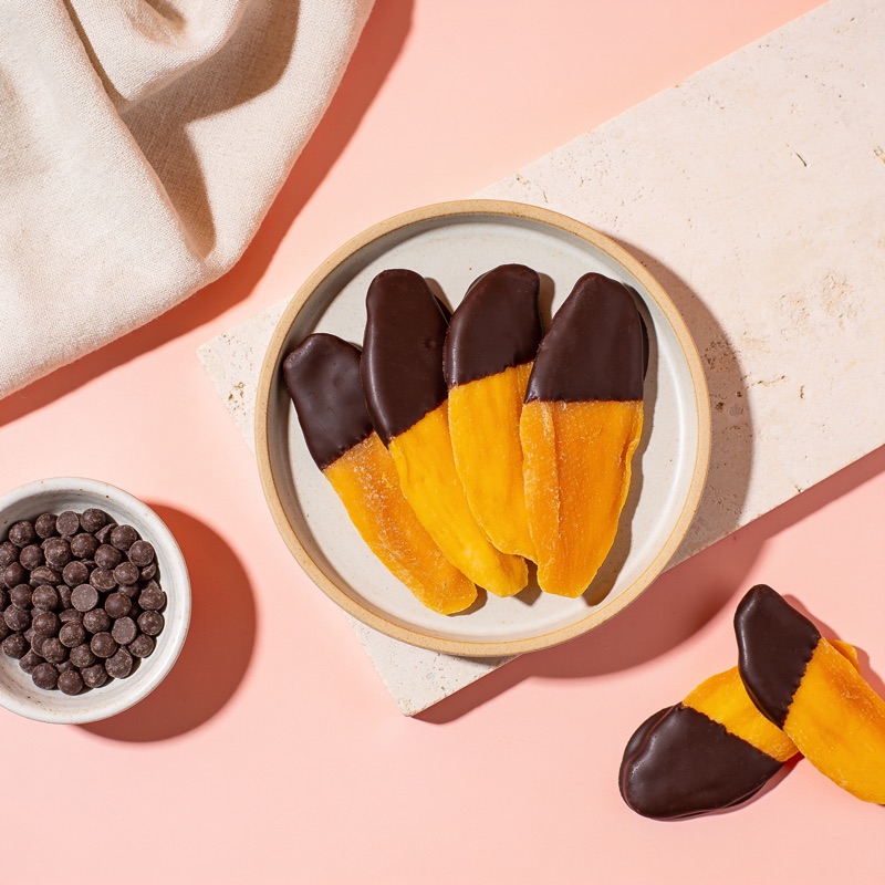 Chocolate-dipped dried mango
