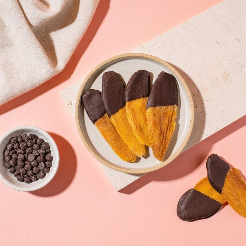 Chocolate-dipped dried mango